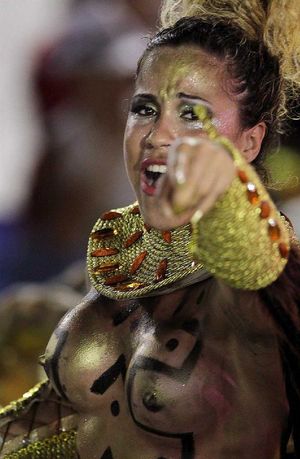 Woman naked on parade with her body painted