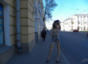 sexy brunette in dress with tits out