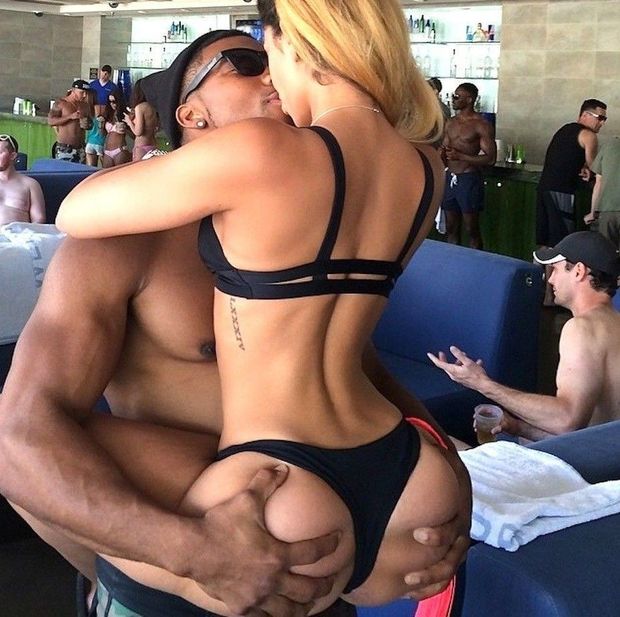 Her boyfriend is getting drinks.