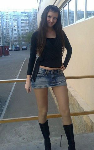 Pretty teen posing outside