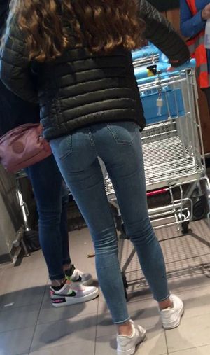 Candid teen in blue jeans