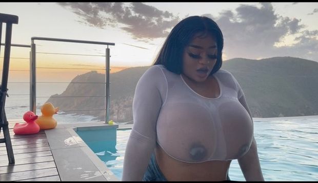 Kim Manana in a wet shirt