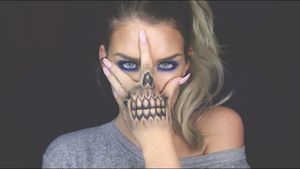 Skeleton Face Hand Tattoo
