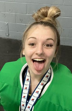 Keyra hockey uniform tongue out