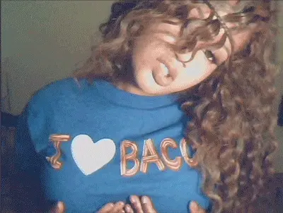 Raychiel cupping her boobs