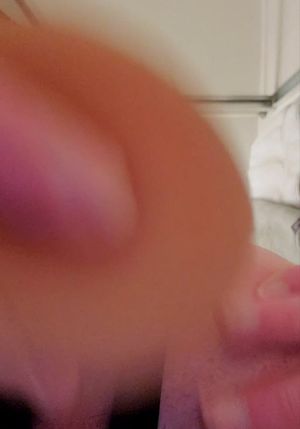 Drilling her ass with a dildo