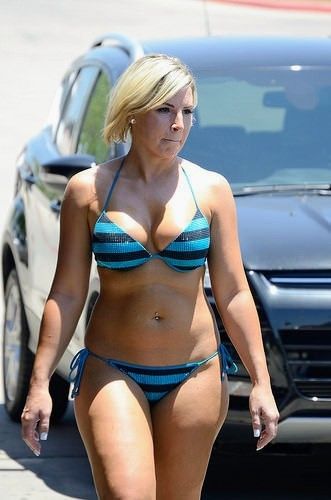My sexy mom walking from the bar to the beach!  My goal today is to get her ass drunk and fuck her in our hotel room tonight!