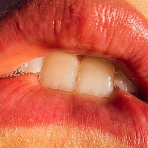 Biting lip in ecstasy