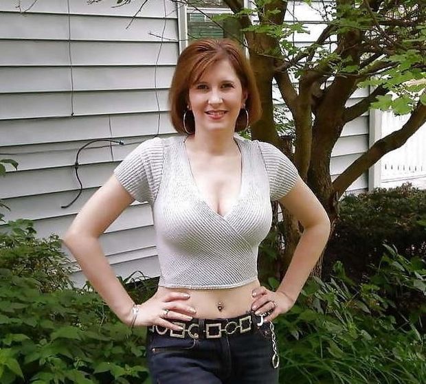 Sexy neighbors wife, my plan is to fuck that slut by the time I turn 16!  She flirts with me all the time, she posed for this picture for me
