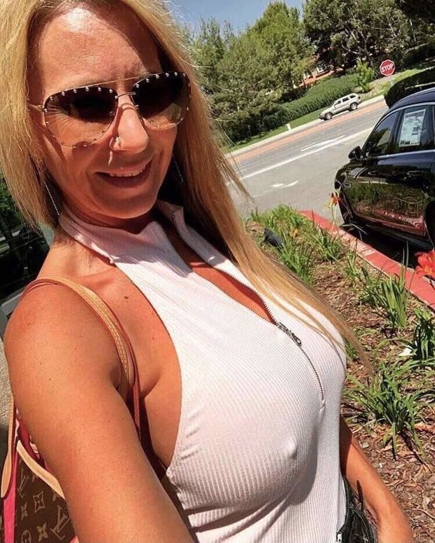Pamela looking sexy in tight top with her nipples hard!  Her teenage son took the picture!