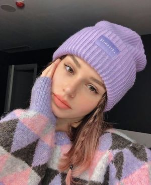 sweet brunette nonnude wearing hat