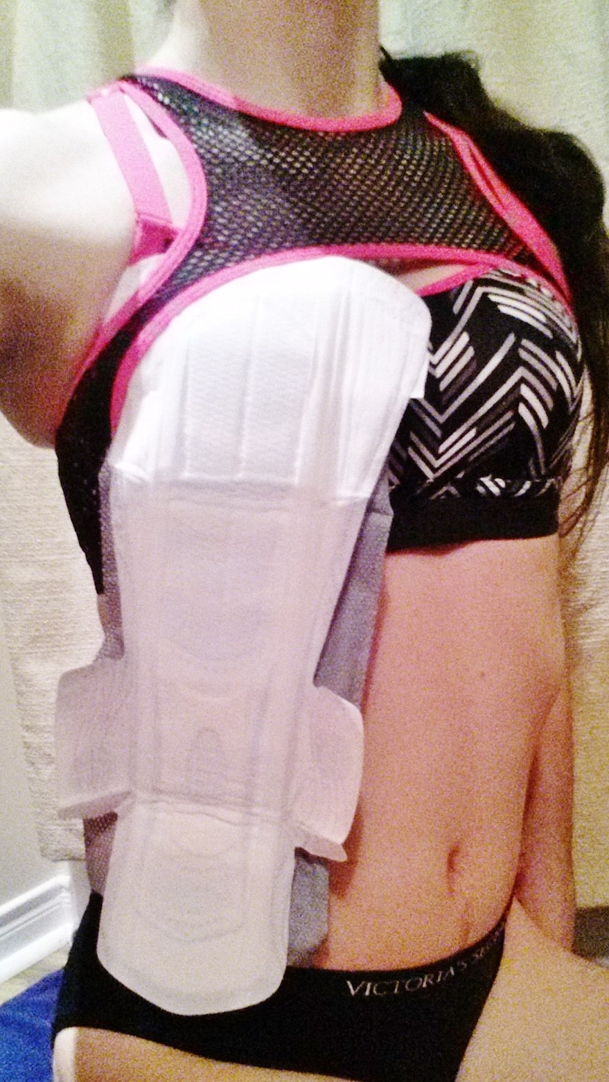 A thin slut next to her Kotex pad