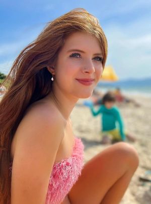 Julia pink fuzzy top beautiful face