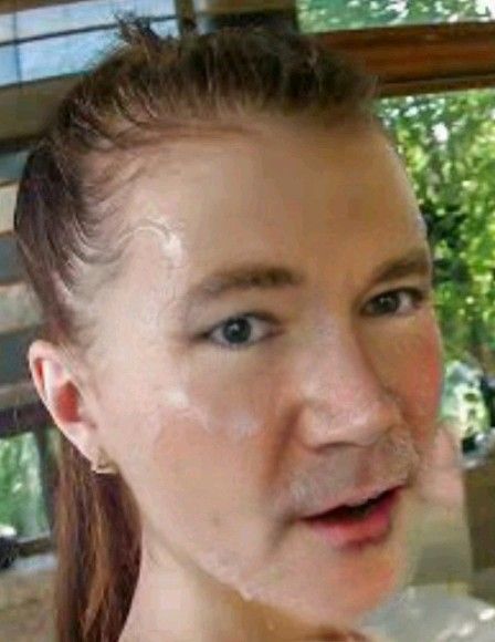 Me crossdressing with cum on my face