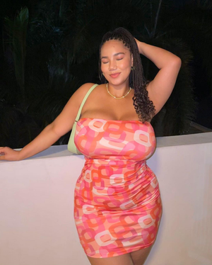 Katelyn Sade looking cute in her figure hugging dress