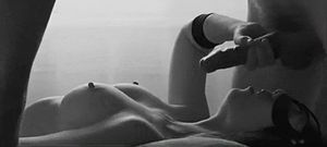 giving handjob while sucking balls