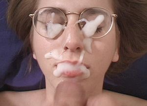 Nerdy Vivian gets her face soaked in thick jizz