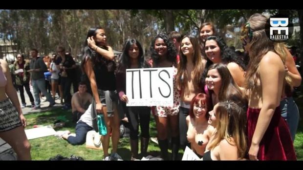 free the nipple protesters in california, baring their breasts with their professors (best part is at 0:32, but there are breasts throughout)