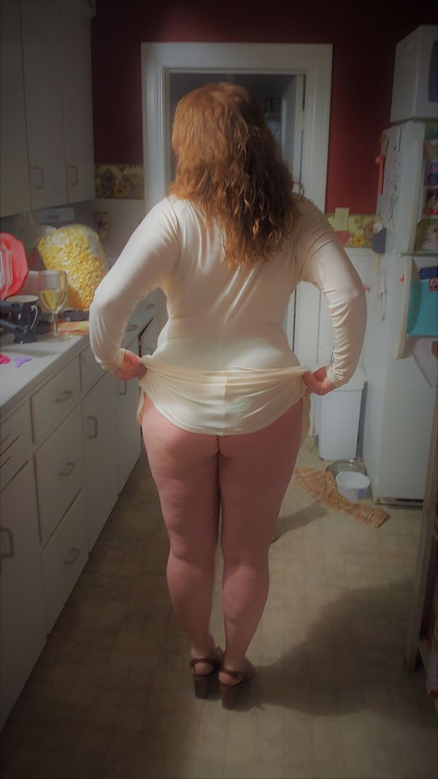 Erotic redhead tease