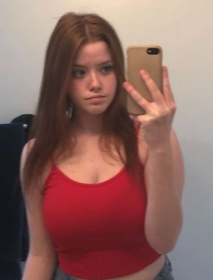 Teen in red tank top