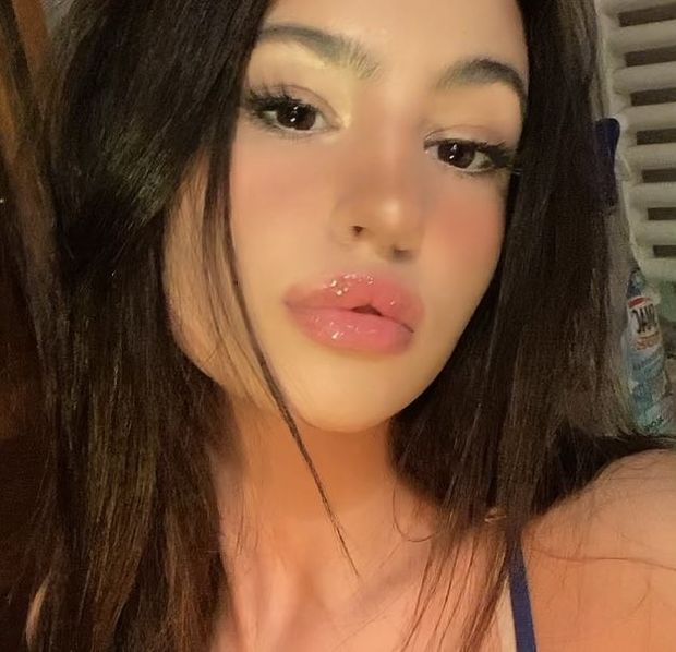 Guess her age…