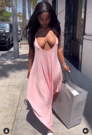 Stunning bra-less ebony queen