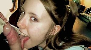 Cute amateur brunette teen licking a cock