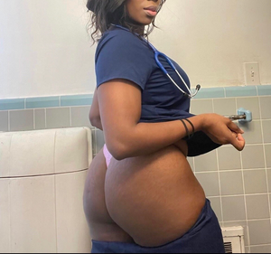 Ebony nurse with her pants down