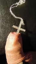 Faggot sounding and blessing his meat for Satan.