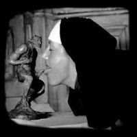 A nun-renounces her vows and kisses Satan's mighty cock!