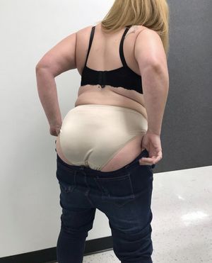 Blonde soccer mom getting ready