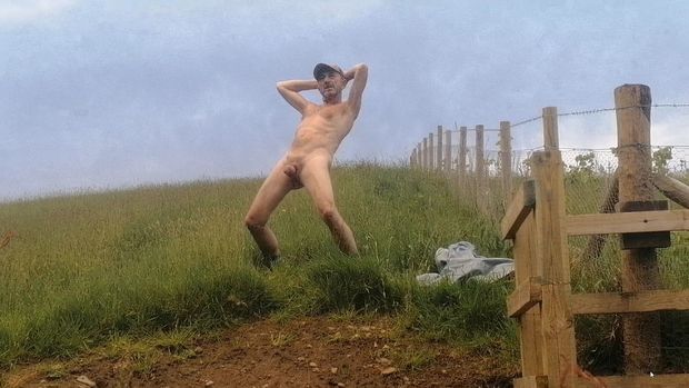 Naked male outdoors in public area