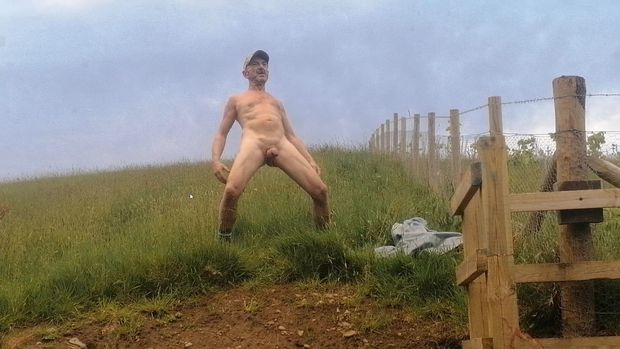Naked male outdoors in public area