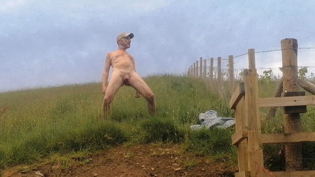 Naked male outdoors in public area