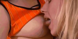 Retro blonde licking brunette's tits