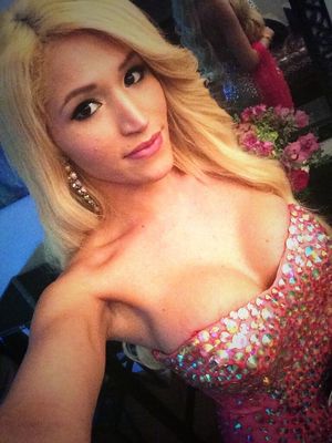 Sofia Ferrera blonde TS big tits cleavage in dress selfie
