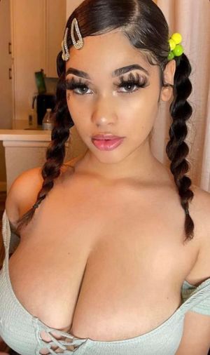 Lexie cleavage pigtails looking straight