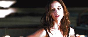 Eliza Dushku - strips off