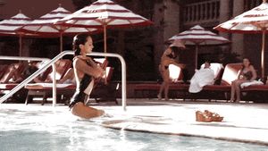 Eliza Dushku -steps out of pool