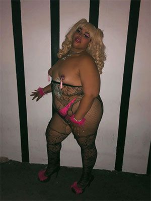 Obese black tranny wearing a burlesque outfit in Miami FL