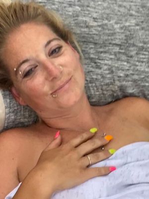 Drunk Danielle getting talked out of her clothes!