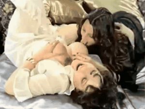 Retro brunette lesbians licking big tits
