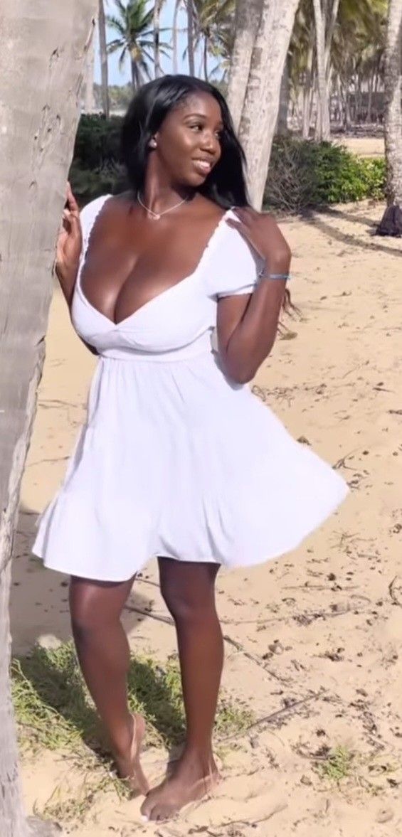 Ellie Mae white dress on beach