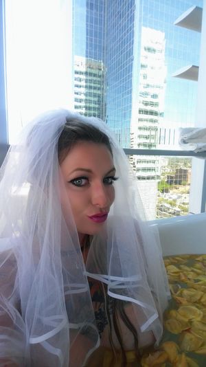 Bimbo housewife slut abbie bathing. Blonde Slutabbie playing with her big fake tits in the tub. Arizona bimbo whore Slutabbie