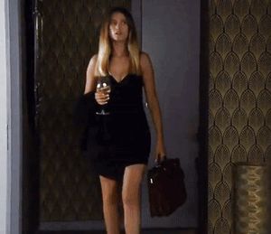 Emmerdale Debbie Dingle very short black dress walking in hotel room