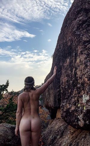 Round bum by the rocks.