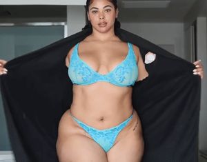 Tabria Majors taking off her robe and showing off her lingerie