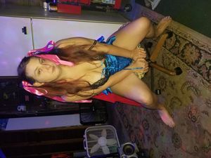 Whore shows cleavage