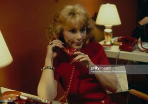 Wicked long red nails.