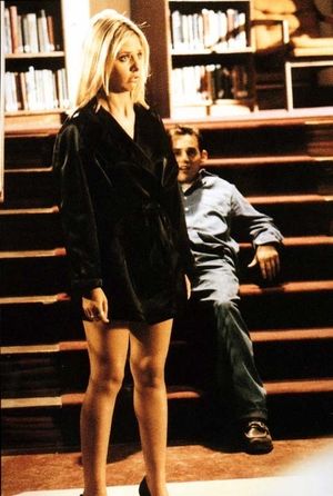 BUFFY IN SHORT BLACK, RAINCOAT SEXY LONG LEGS PIC